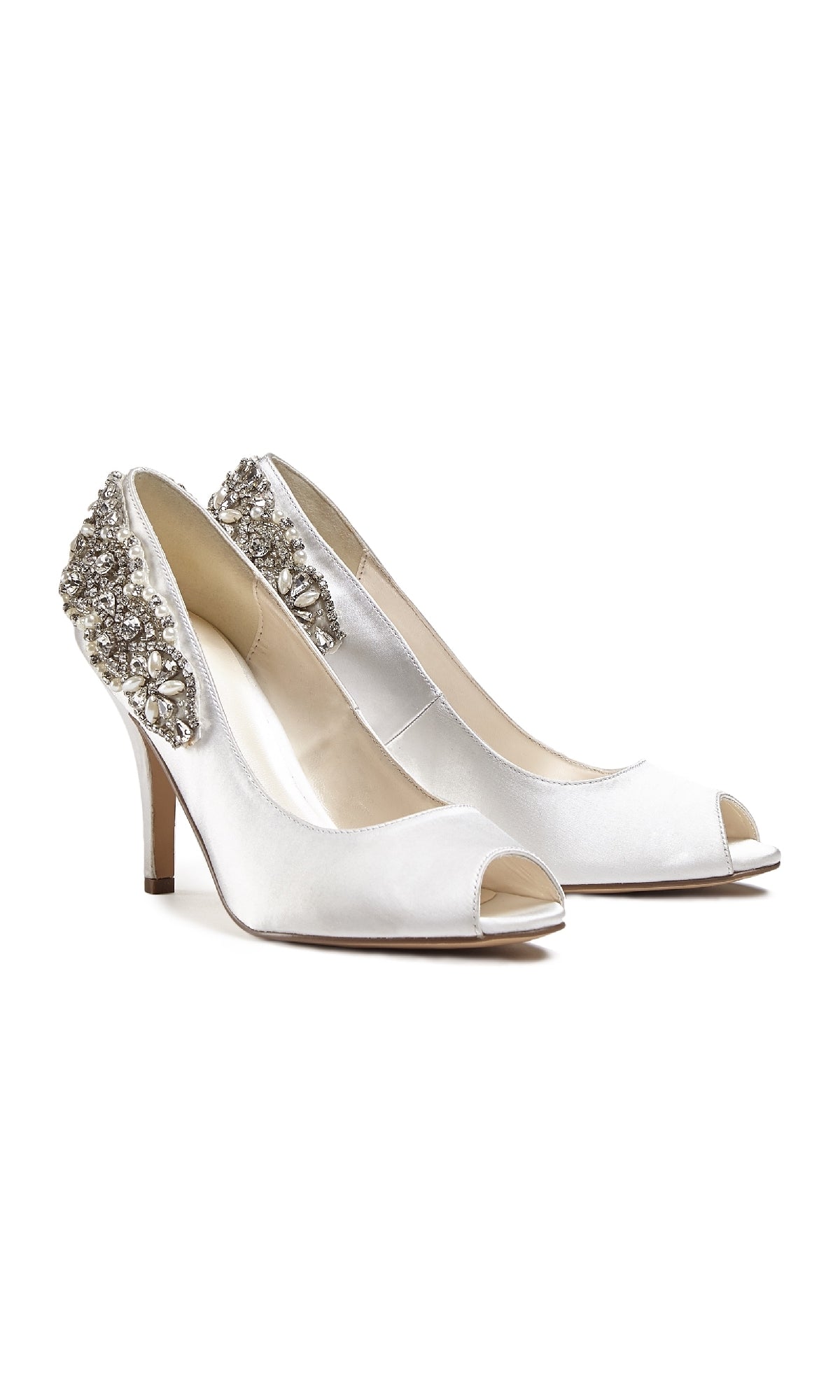 The Cynthia Ivory Prom Shoes: Paradox London P1809 feature white satin, stiletto heels, peep toes, and a jeweled heel with sparkling crystal details—perfect for a glamorous night.